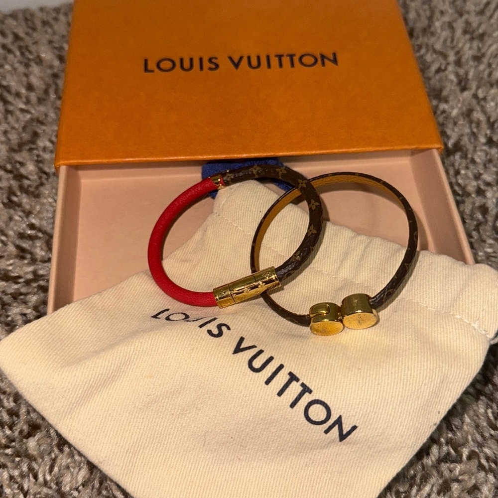 Louis Vuitton leather bracelets.